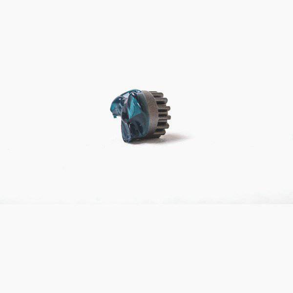 Park Tool 2171 Post Mount Cutter DT-5.2 for precise bike brake adjustments in a workshop setting, showing the cutting tool in use.