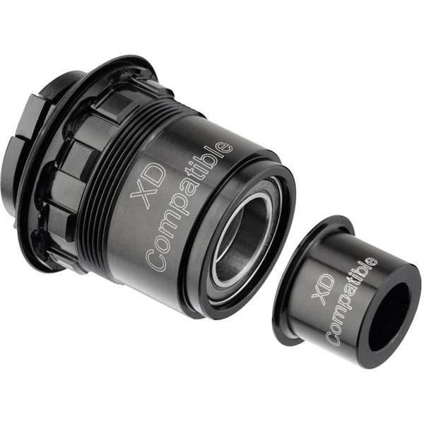 DT Swiss Pconkitsramxd MTB 142/12 hub spares kit showing components for 3-pawl freehub systems in a close-up shot