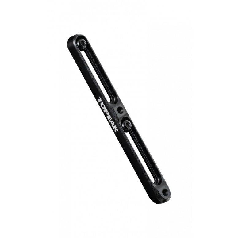 Black Topeak CNC aluminum cage mount extender for adjustable bottle cages, shown with the spacer attached.