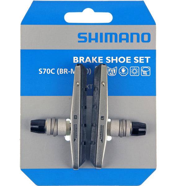 Shimano M70R2 BR-M770 medium power cartridge brake shoes for alloy rims, shown as a pair of bike brake components.