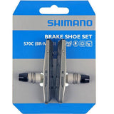 Shimano M70R2 BR-M770 medium power cartridge brake shoes for alloy rims, shown as a pair of bike brake components.