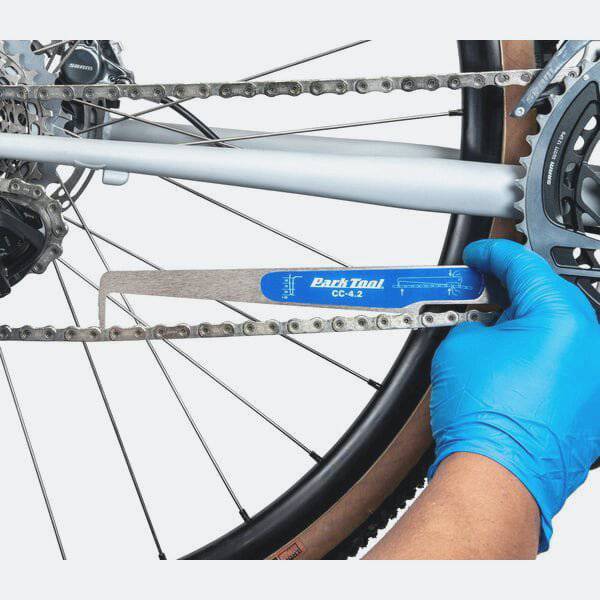 Park Tool CC-4.2 chain wear indicator gauge for 5 to 13-speed and single-speed bike chains, used in workshop maintenance.