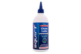 Squirt Workshop Chain Lube by Squirt, eco-friendly bicycle chain lubricant, shown on a bicycle chain for long-lasting performance.
