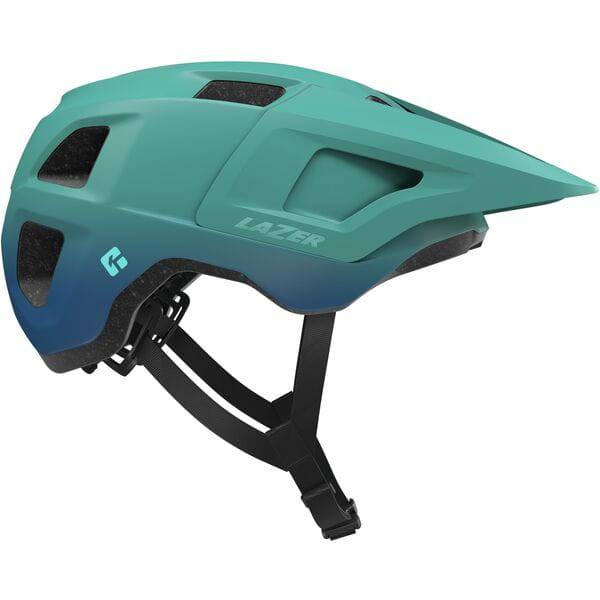 Lazer Finch KinetiCore youth trail helmet with adjustable fit and LED light mount, shown in a natural outdoor setting