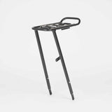 Black M Part Tour AVS front pannier rack on a bike, featuring adjustable design and AVS system for secure attachment.