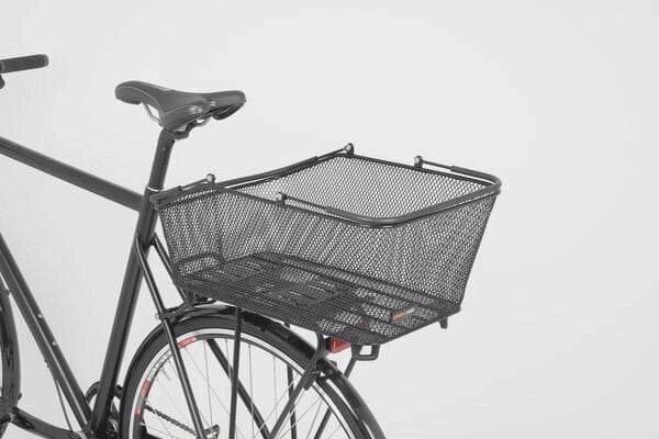 AtranVelo DAILY AVS 28L bike basket with easy attachment for pannier racks, mounted on a bicycle for carrying gear.