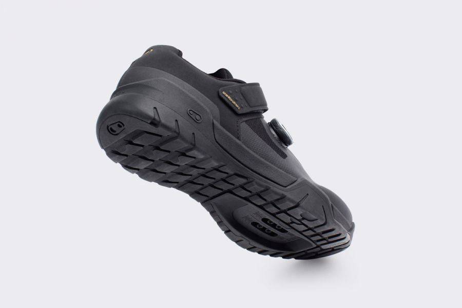 Crank Brothers Malllet E BOA MTB shoes with stiff shank and clipless pedal compatibility, shown in a close-up view.