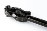 Cane Creek Thudbuster LT G4 suspension seatpost with tool-free elastomer adjustment, shown installed on a bicycle component.