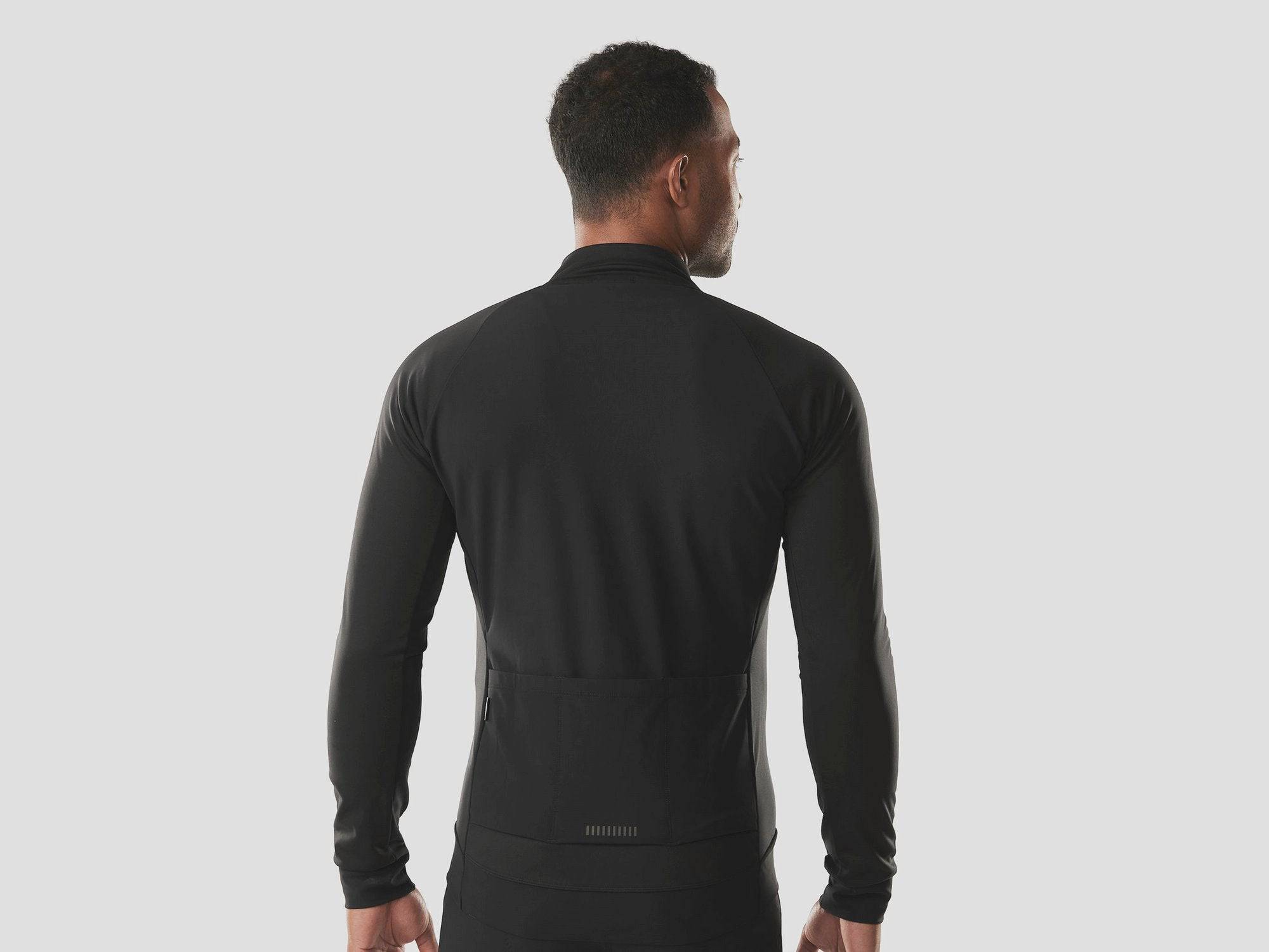 Trek Circuit softshell cycling jacket with windproof, waterproof fabric and fleece lining, designed for outdoor riding.