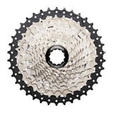 MicroSHIFT Sword G-Series 10-speed cassette with 11-38T gear ratio for standard freehub wheels, shown on a bike wheel.