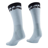 Mavic Aksium high cycling socks with breathable, durable eco-friendly fabric, shown in a close-up view.