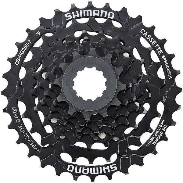 Shimano Alivio CS-HG200 7-speed bike cassette with 12-32T gear range, shown with metal cogs for smooth shifting.