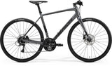 Merida Speeder 100 MY24 hybrid bike in anthracite and black with lightweight frame and hydraulic disc brakes for versatile commuting.