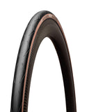 Hutchinson Blackbird tubeless-ready road bike tire with tan wall sidewalls and high-performance rubber tread for road cycling.