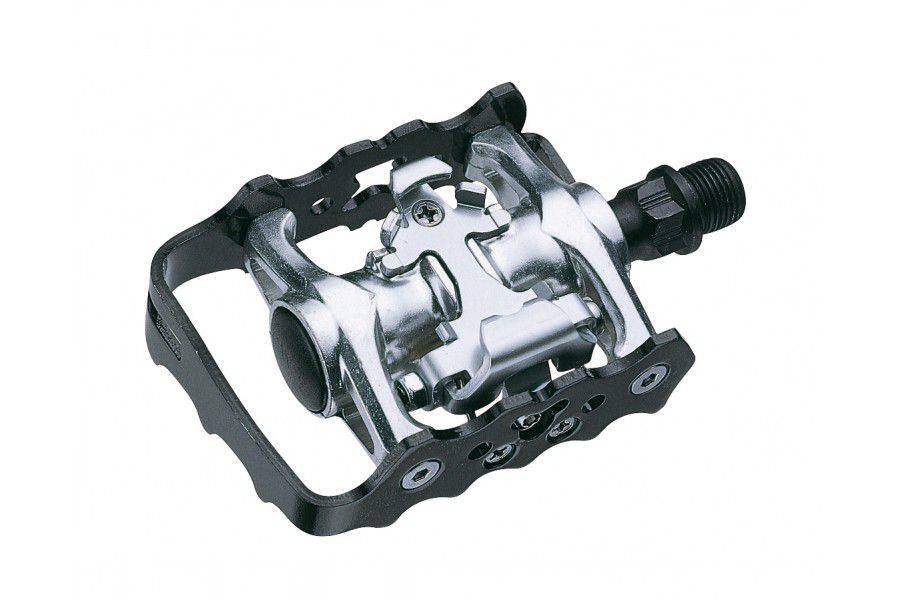 System EX D5200 silver and black dual-function cycling pedals with E-CO1 cleats, designed for versatile road and mountain biking.