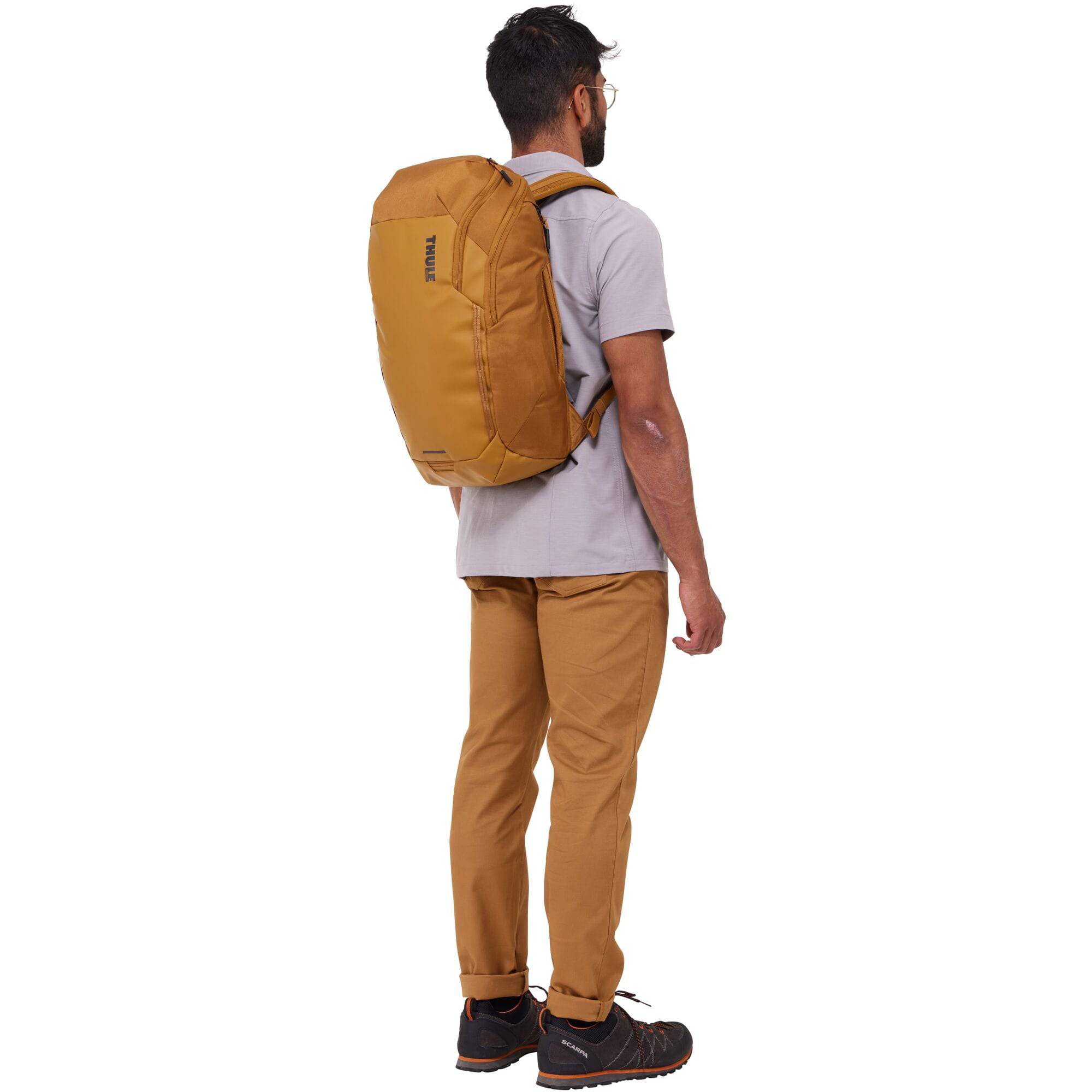 Thule Chasm Recycled 26L backpack showing durable, weather-resistant design with padded laptop compartment and outdoor-ready features.