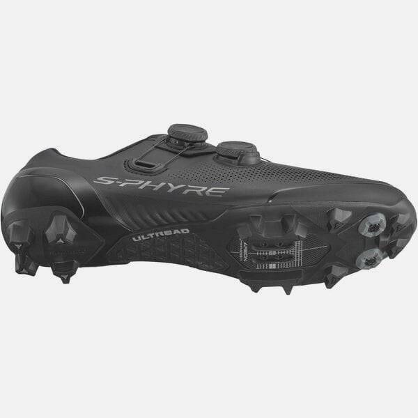 Shimano S-PHYRE XC9 MTB shoes for cross-country cycling, featuring a sleek black design and secure lacing system.