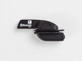 Bontrager DuoTrap S wireless speed and cadence sensor in black, mounted on a bicycle component, used for cycling metrics.