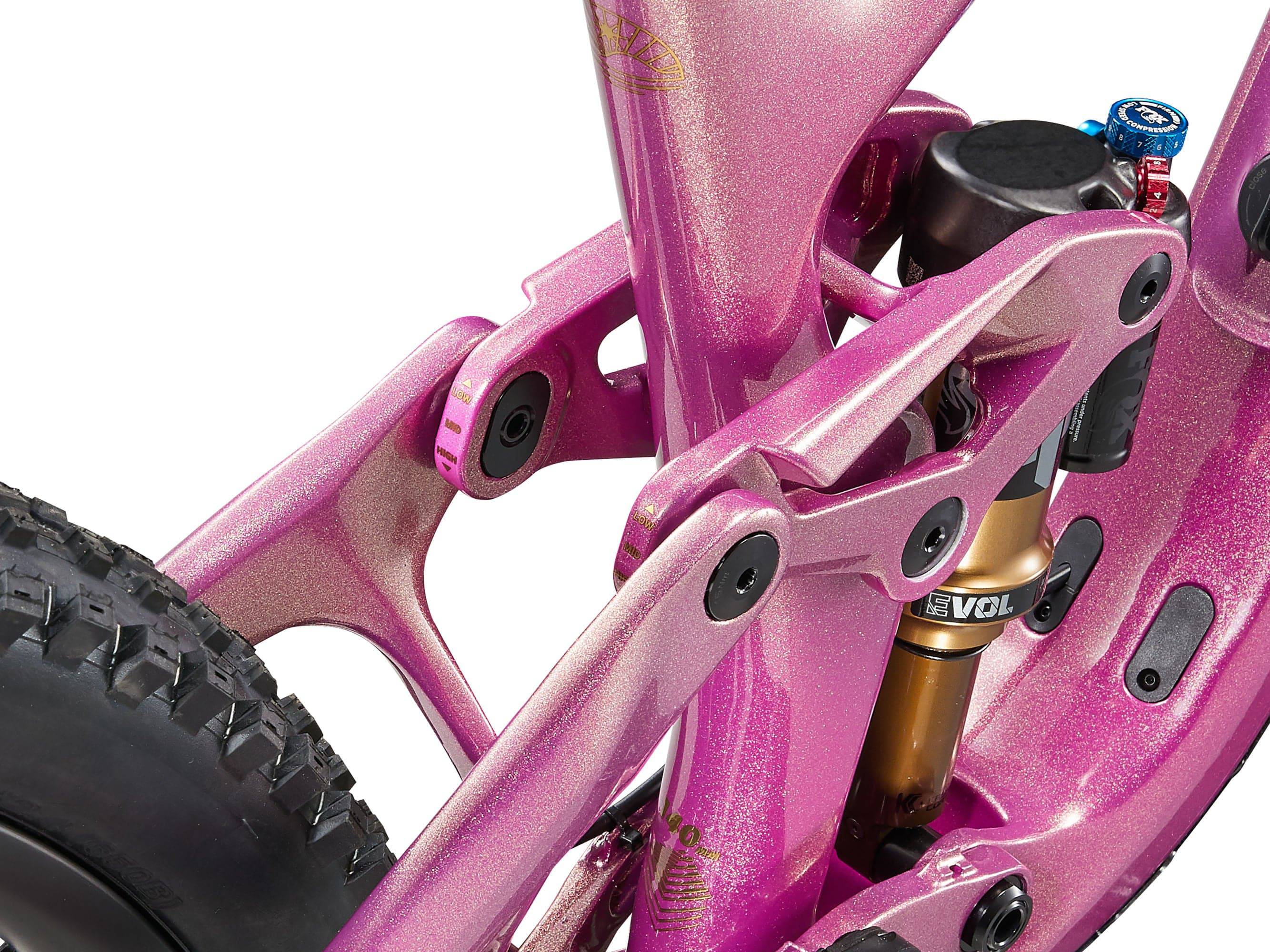 Liv Intrigue X Advanced 0 mountain bike with adjustable geometry and suspension system, shown in a riding outdoor setting.