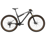 Trek Supercaliber SLR 9.8 XO AXS mountain bike with lightweight frame and IsoStrut suspension system, ready for trail riding.