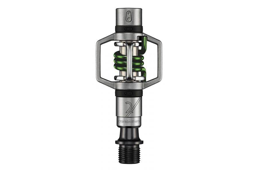Crankbrothers Eggbeater 2 silver and green MTB pedals with mud shedding design, durable components for mountain biking.