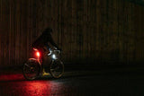 Knog Big Cobber bike light set with USB rechargeability, waterproof design, and 330° visibility for cycling safety.