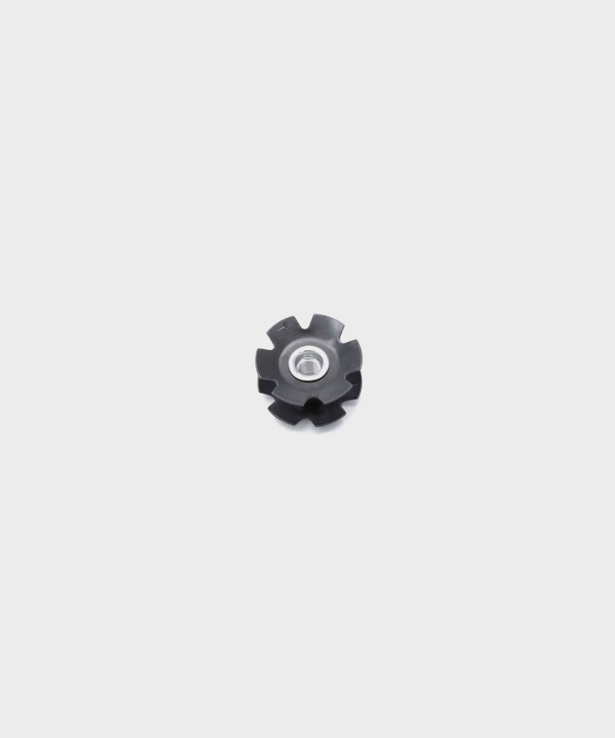 Fox Fastener custom metric star fangled nut for M6 x 1.0 threading, showing a close-up of the metal component with star fangled design
