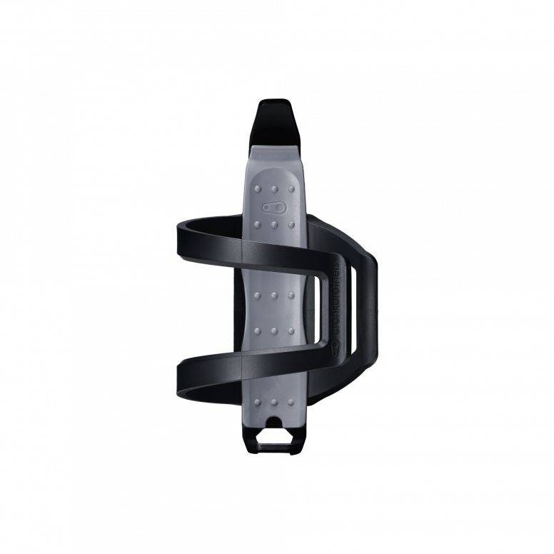 Crankbrothers BC2 SOS Bottle Cage with integrated tire repair tools in black and silver, designed for bike workshop use.