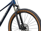 Giant Talon 29 0 mountain bike with Shimano Deore M6100 drivetrain and disc brakes, showing the bike's frame and front wheel.