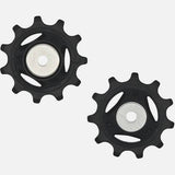 Shimano 105 RD-R7100 rear derailleur tension and guide pulley set for bike components, in black with metal pulleys.