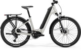 Merida eSpresso CC 575 EQ e-hybrid bike with Shimano STEPS motor, commuter accessories, and a sleek frame for urban riding.