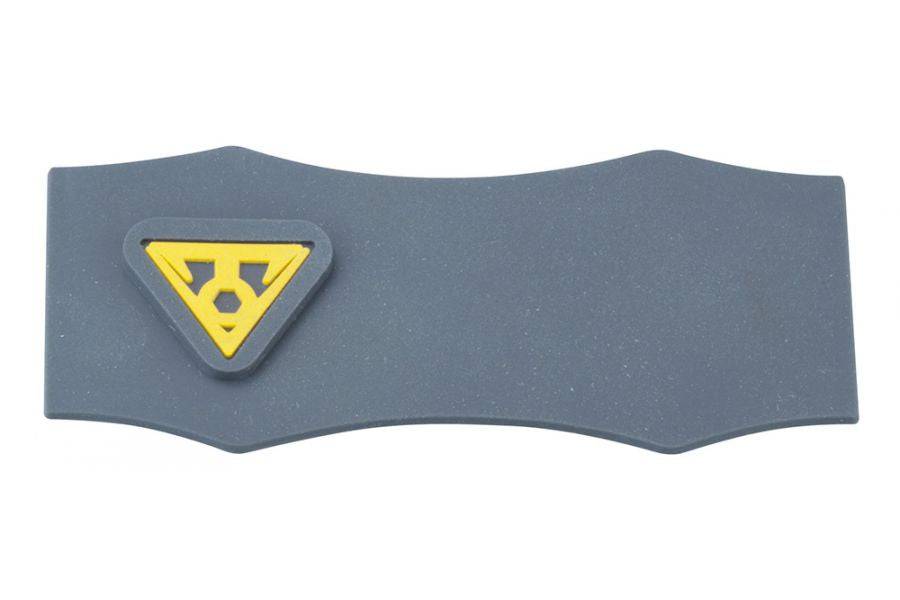 Topeak RX Beam Rack Shim 1.2mm black and yellow bike rack accessory mounted on a bike frame for secure attachment.