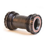 Wheels Manufacturing T47 outboard angular contact bearings for 30mm crank bottom bracket, close-up of black bearings in packaging