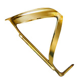 Supacaz Fly Cage Limited Gold bike bottle cage, hand-painted aluminum cycling accessory, lightweight and stylish bike hydration holder.