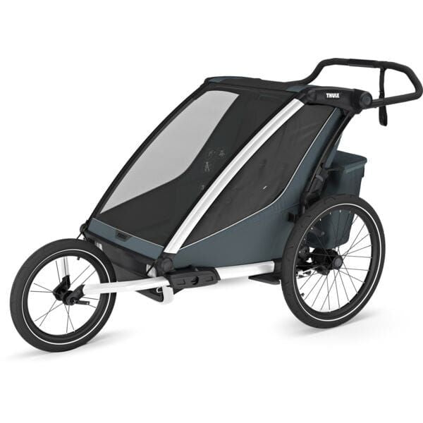 Thule Chariot Cross 2 double child carrier with cycling and strolling kits, featuring safety harnesses and adjustable seating.