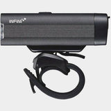 Infini KOR 800 front bike light with 800 lumens, rechargeable USB, and five lighting modes, mounted on a bicycle.