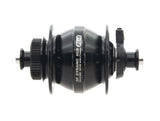 SP PL-8 Power Dynamo hub mounted on bicycle wheel, used for bicycle lighting and accessories, reliable cycling component.