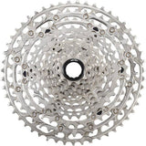 Shimano Deore Deore CS-M6100 12-speed MTB cassette with 10-51T gears and Hyperglide technology, shown on a bike drivetrain.