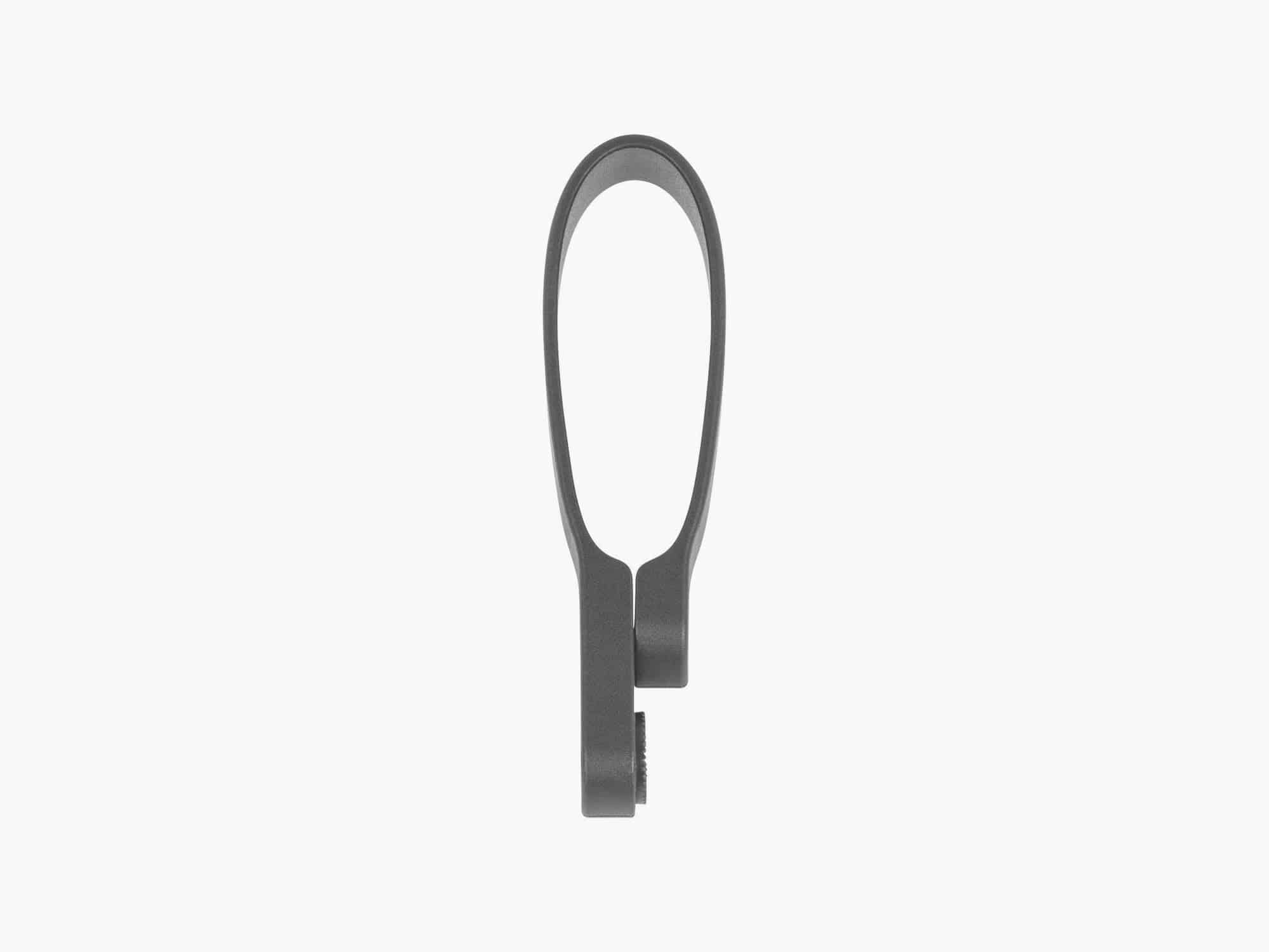 Black Trek Madone Gen 7 rear reflector mount for bike components, designed for secure attachment on Trek road bikes.