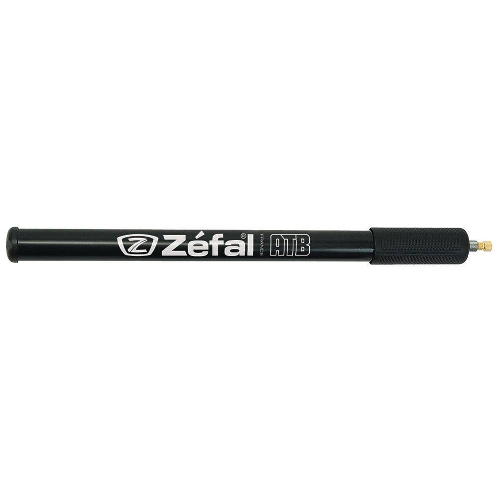 Zefal hand pump for ATB bikes with flexible Schrader and Presta valve adapters, compact bike accessories for inflating tires.