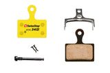 SwissStop Disc 34 brake pads for Shimano Road Dura Ace, Ultegra, and 105 brake systems, shown in a close-up view of the components.