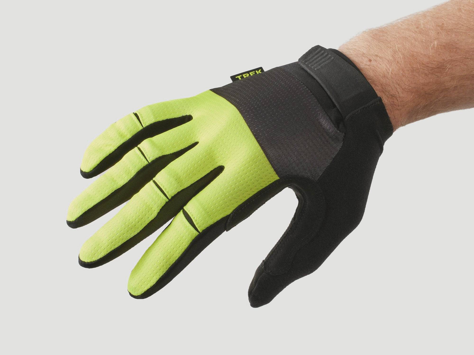 Trek Circuit full-finger unisex cycling gloves with twin gel padding for comfort, shown on a rider's hands.