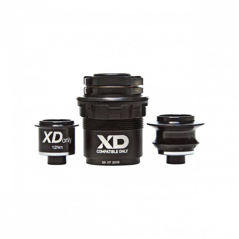 Crankbrothers 150x12mm driveside end cap for XD driver TwinPoke wheels in black, showing the component on a white background.