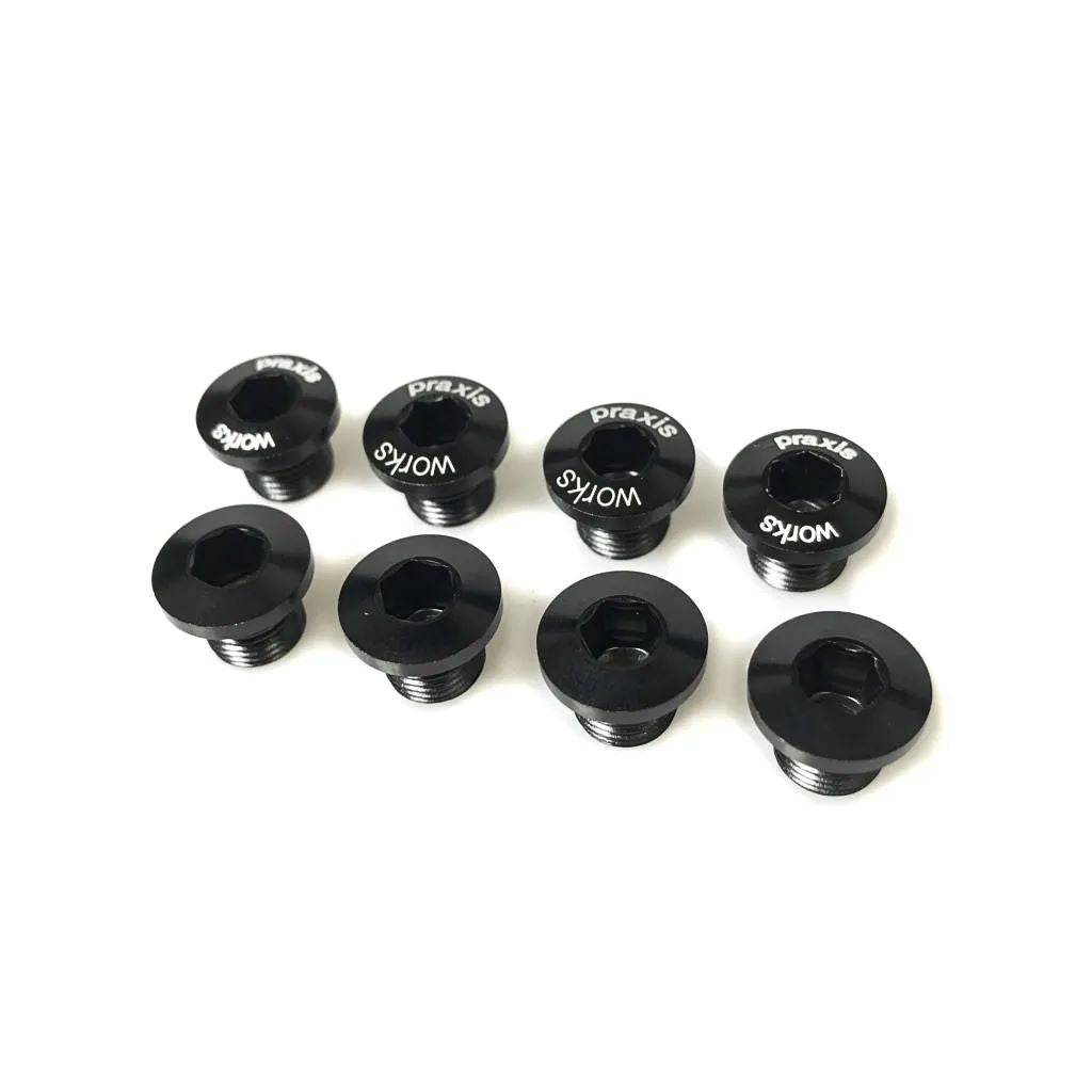 Praxis Works X-Ring bolts spare set with threaded Allen design for X-Spider chainrings, showing close-up of bolts and packaging.