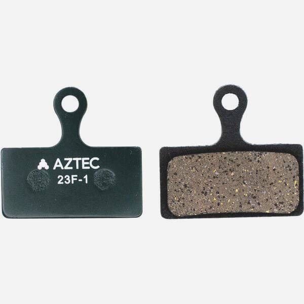 Aztec disc brake pads for Shimano XTR M985, XT M785, and SLX M675 e-bike models, shown with mounting hardware.