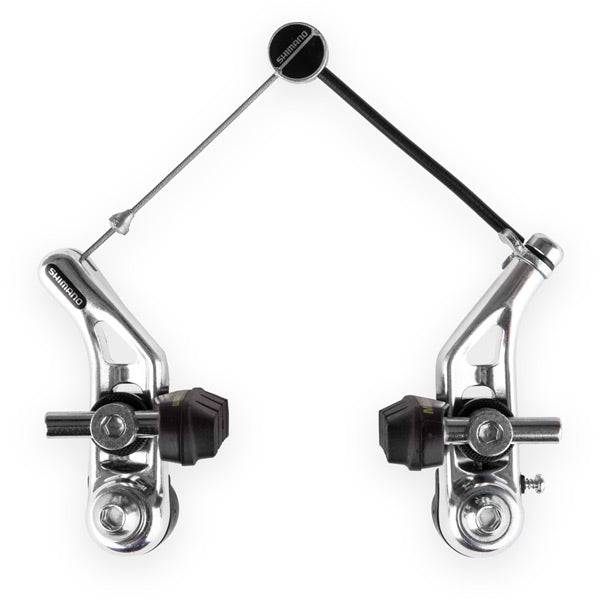 Shimano Altus cantilever brake pair for mountain, cyclo-cross, and touring bikes, showing black brake arms and mounting hardware.