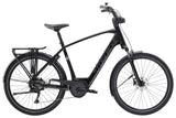 Trek Verve+ 2 Gen 3 2025 electric hybrid bike with comfortable frame and versatile design, shown outdoors on a scenic path.