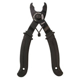 KMC workshop missing link remover pliers for precise chain link maintenance, showing the tool in hand with a bicycle chain.
