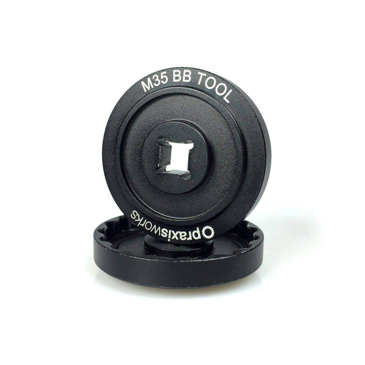 Praxis Works M35 Bottom Bracket Tool 2-Pack with 3/8" socket for Fuji bikes, shown in a workshop setting.
