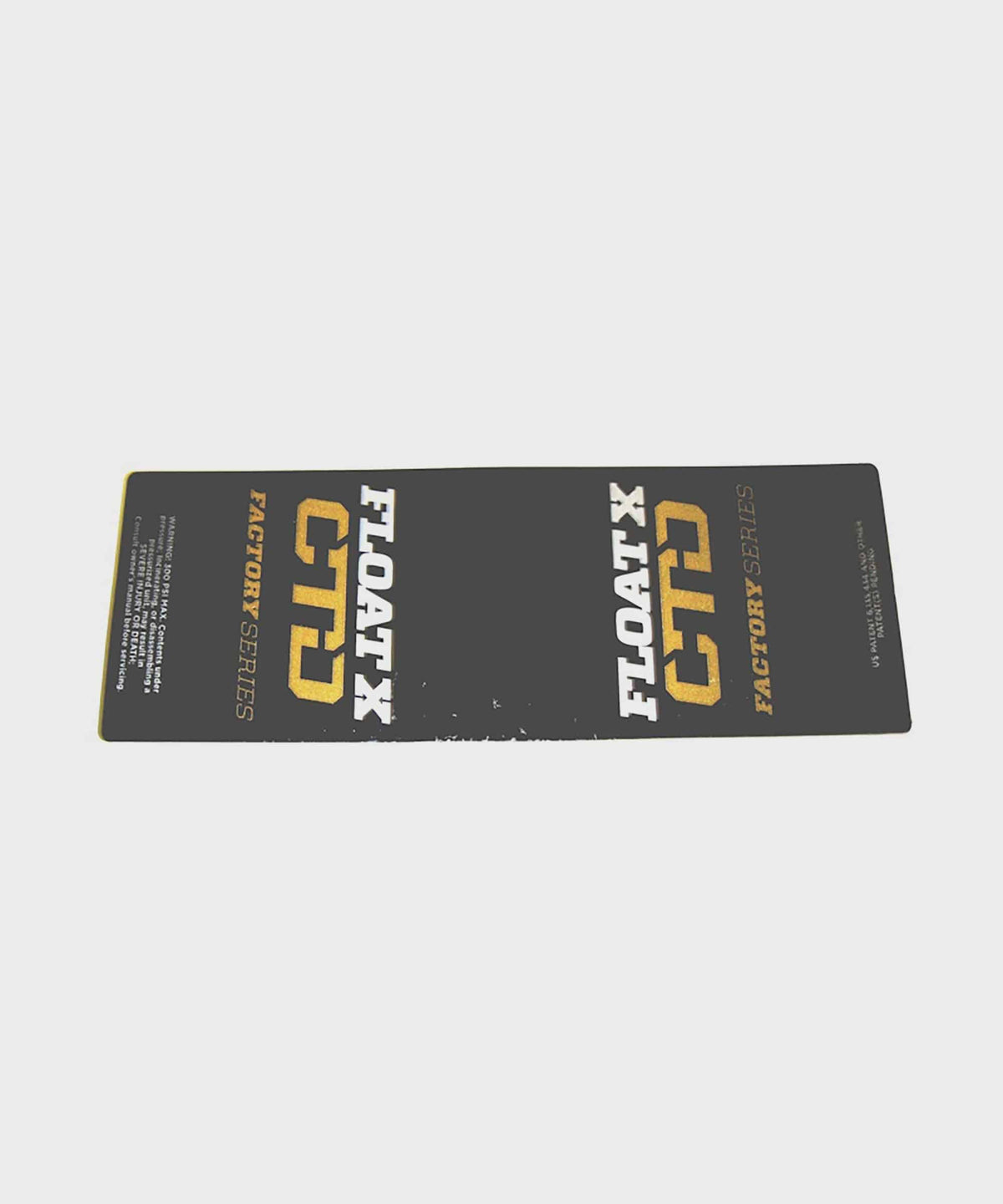 Fox Shock FLOAT X CTD LV 2014 gold decal replacement sticker on rear shock component, featuring bright gold design and branding.